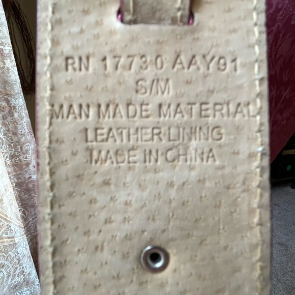 Red belt with silver buckle can be cinched to be small or medium - Picture 3 of 7